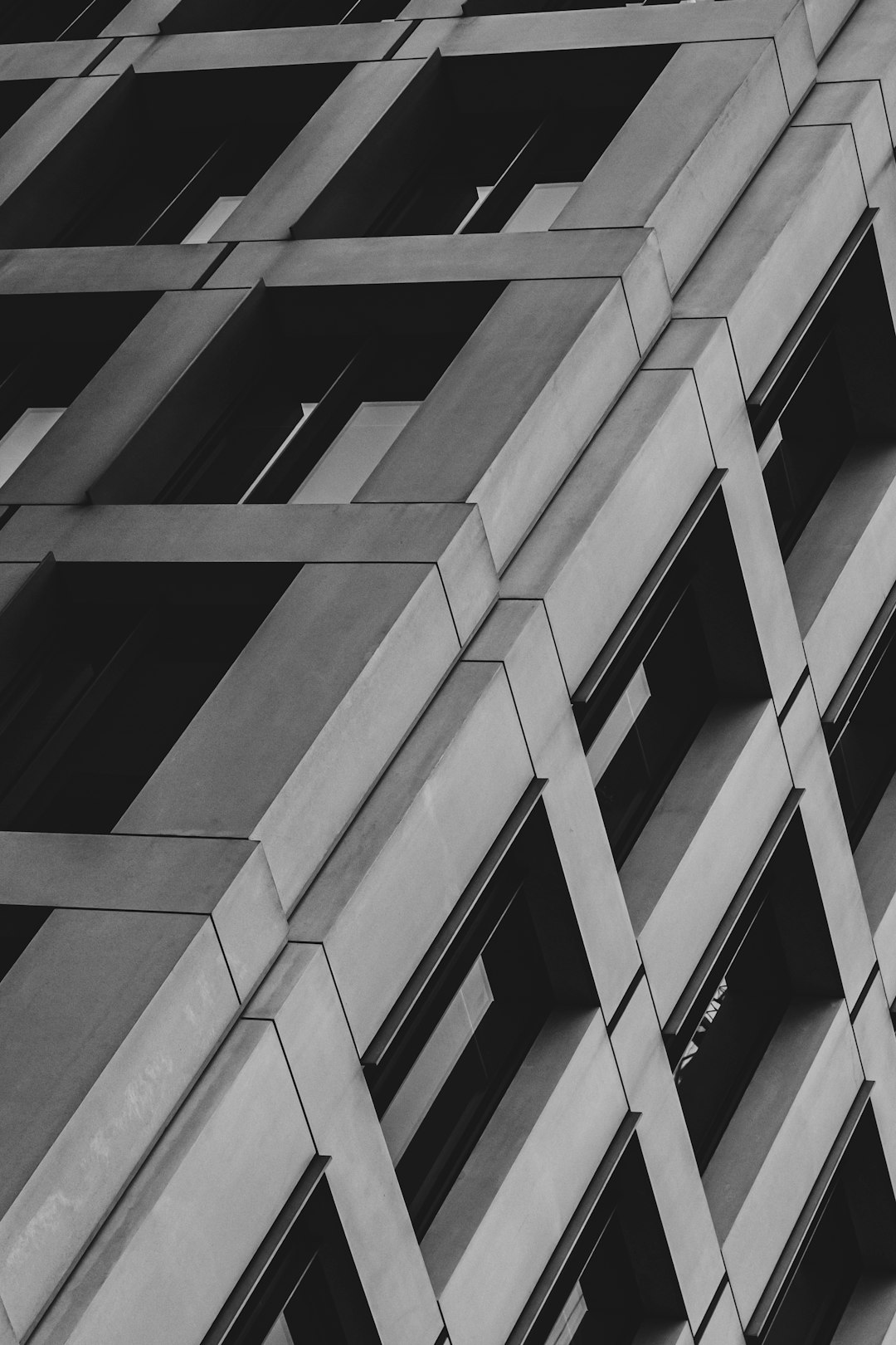 grayscale photo of concrete building