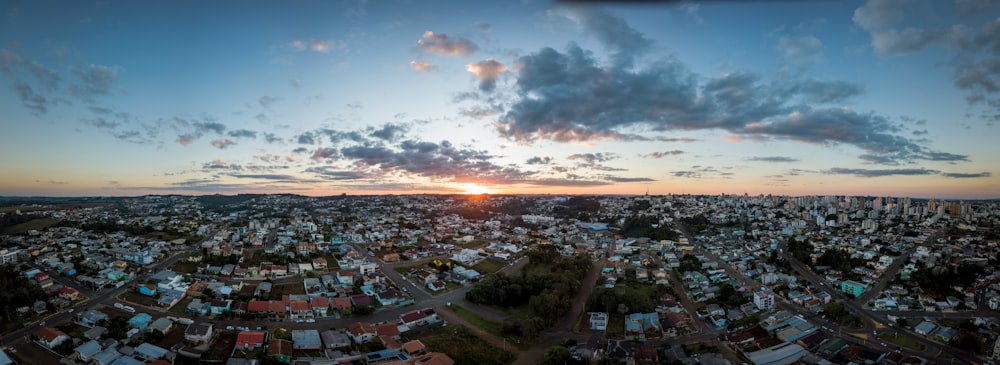 city with high rise buildings under blue sky during sunset