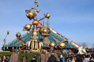 A sprawling airship dock bustling with inventors and fantastical creatures preparing for flight.