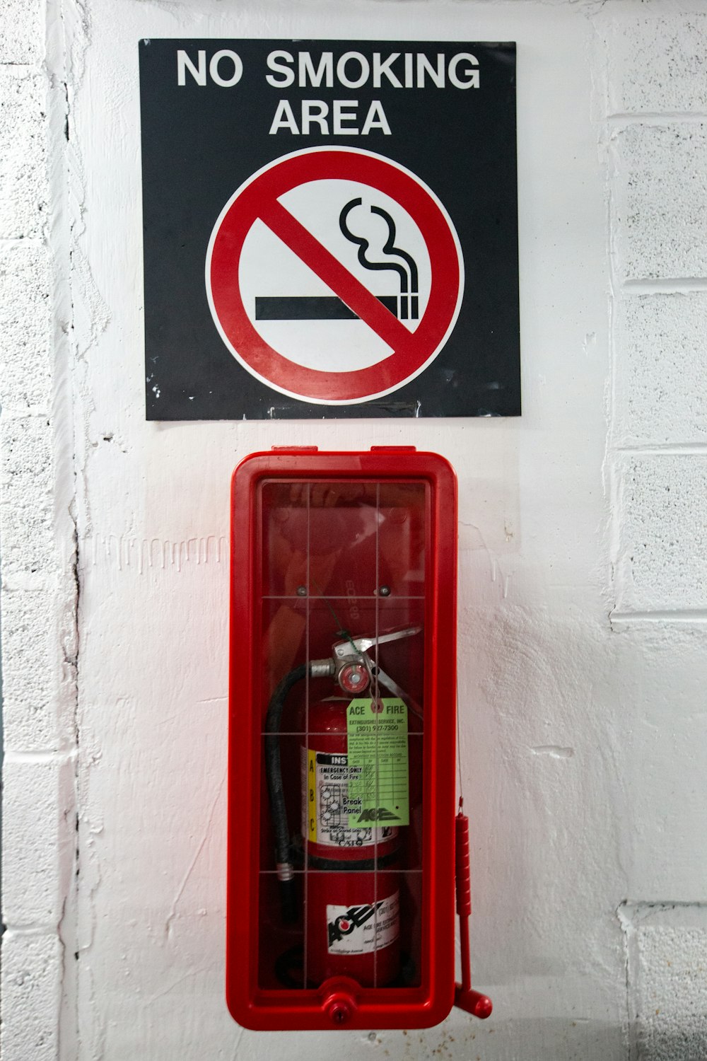 red and white fire extinguisher
