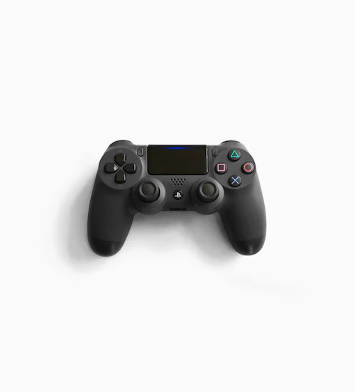 Controle de videogame preto sobre fundo claro