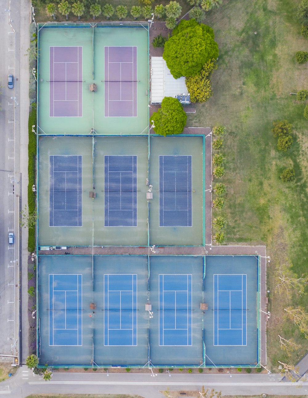 aerial view of green trees and blue steel gate