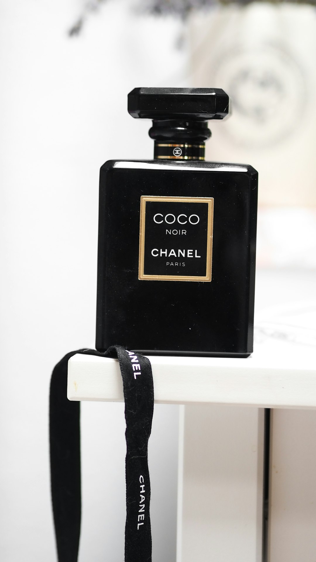 black and gold perfume bottle