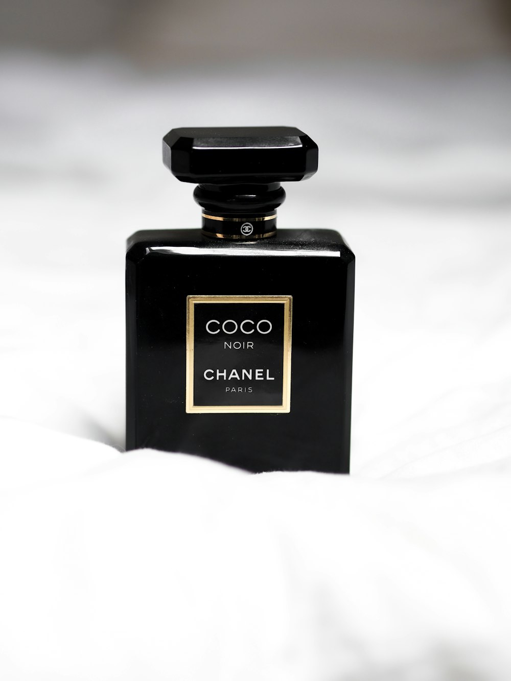 black and gold perfume bottle