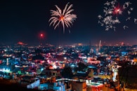 city with high rise buildings during night time