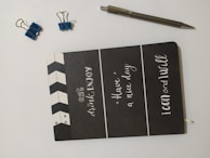 Close-up of a page with motivational quotes and colorful stickers in a wellness-themed planner.