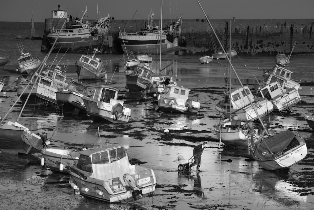 grayscale photo of cars on parking lot