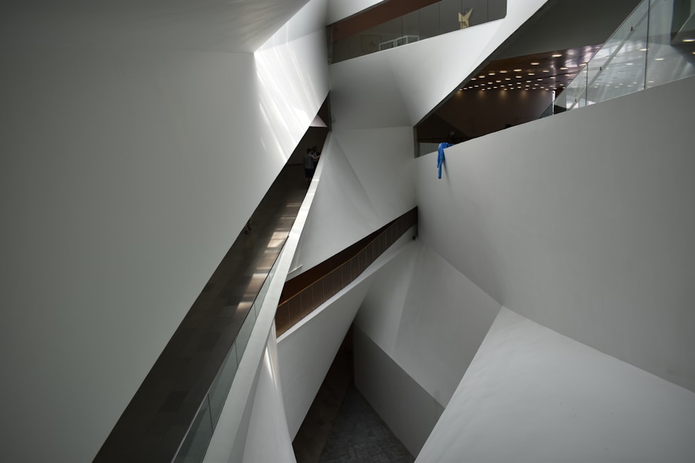 white concrete staircase with white wall