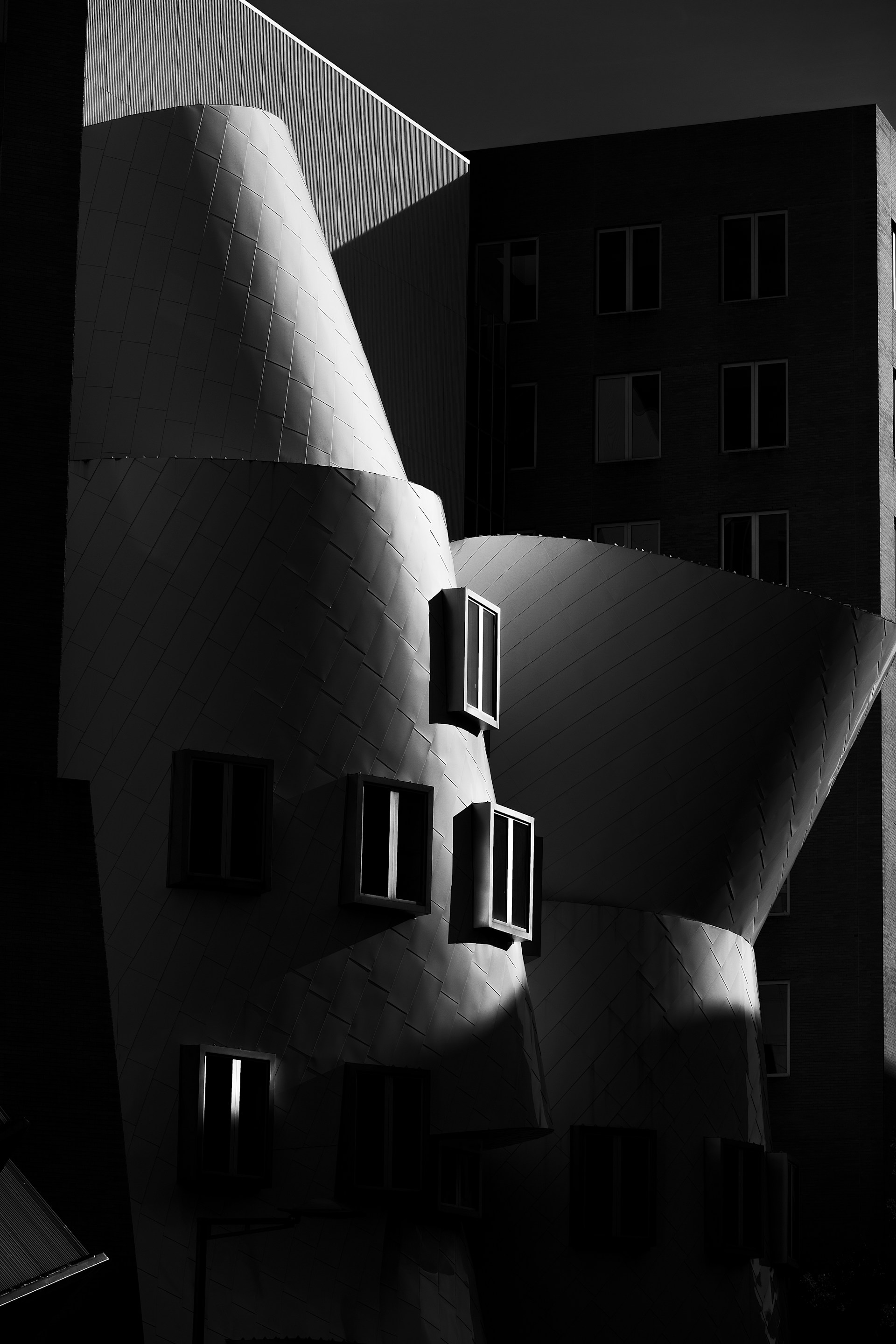 grayscale photo of concrete building