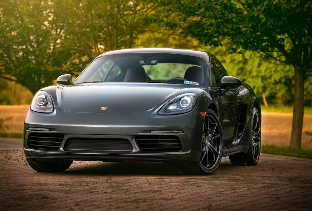 black porsche 911 on road during daytime