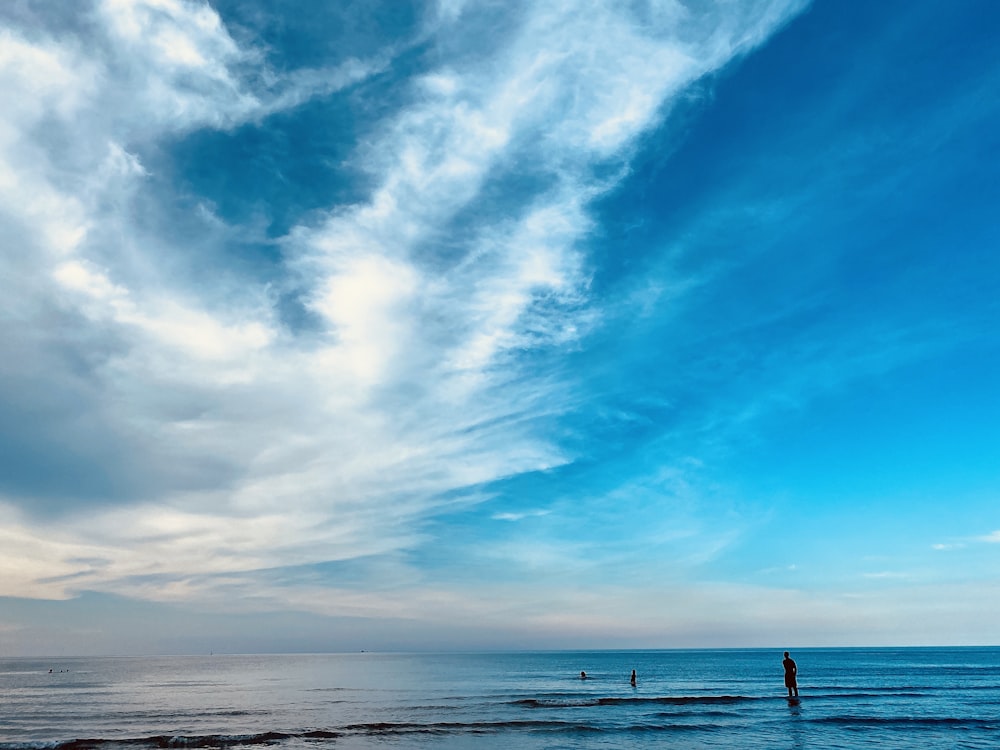 blue sky and white clouds over the sea