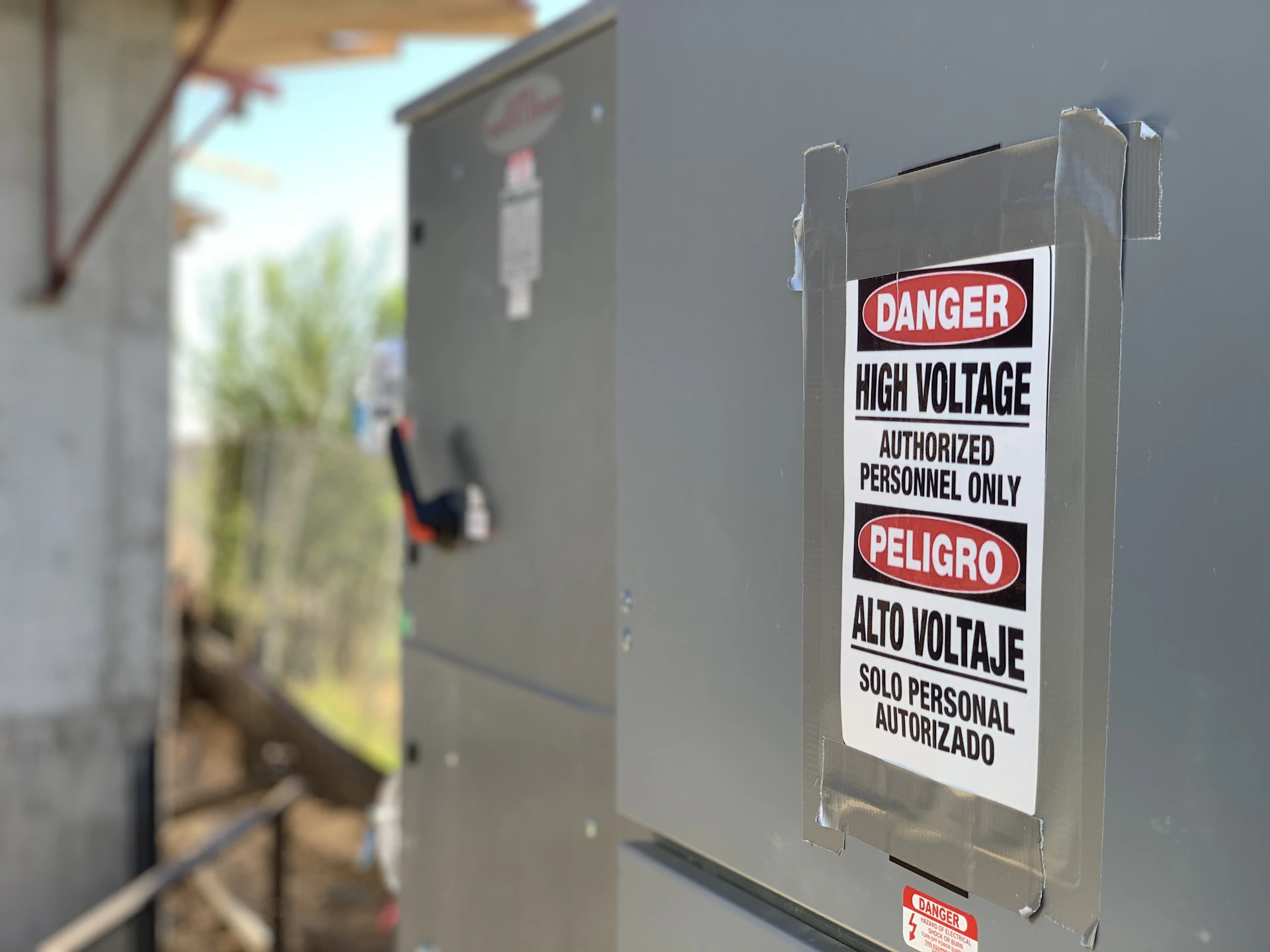 a close up of a metal box with a sign on it