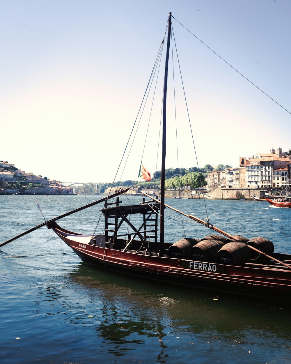 brown boat on body of water during daytime