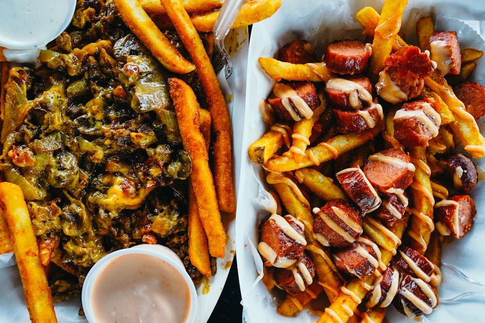 fried fries and sauce on white ceramic plate