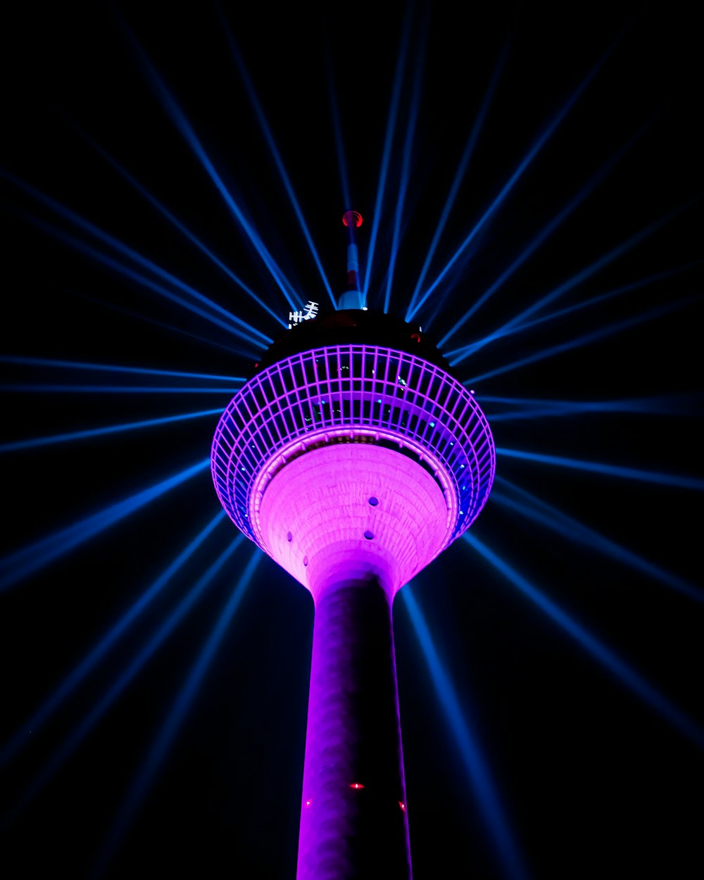 blue and purple lighted tower