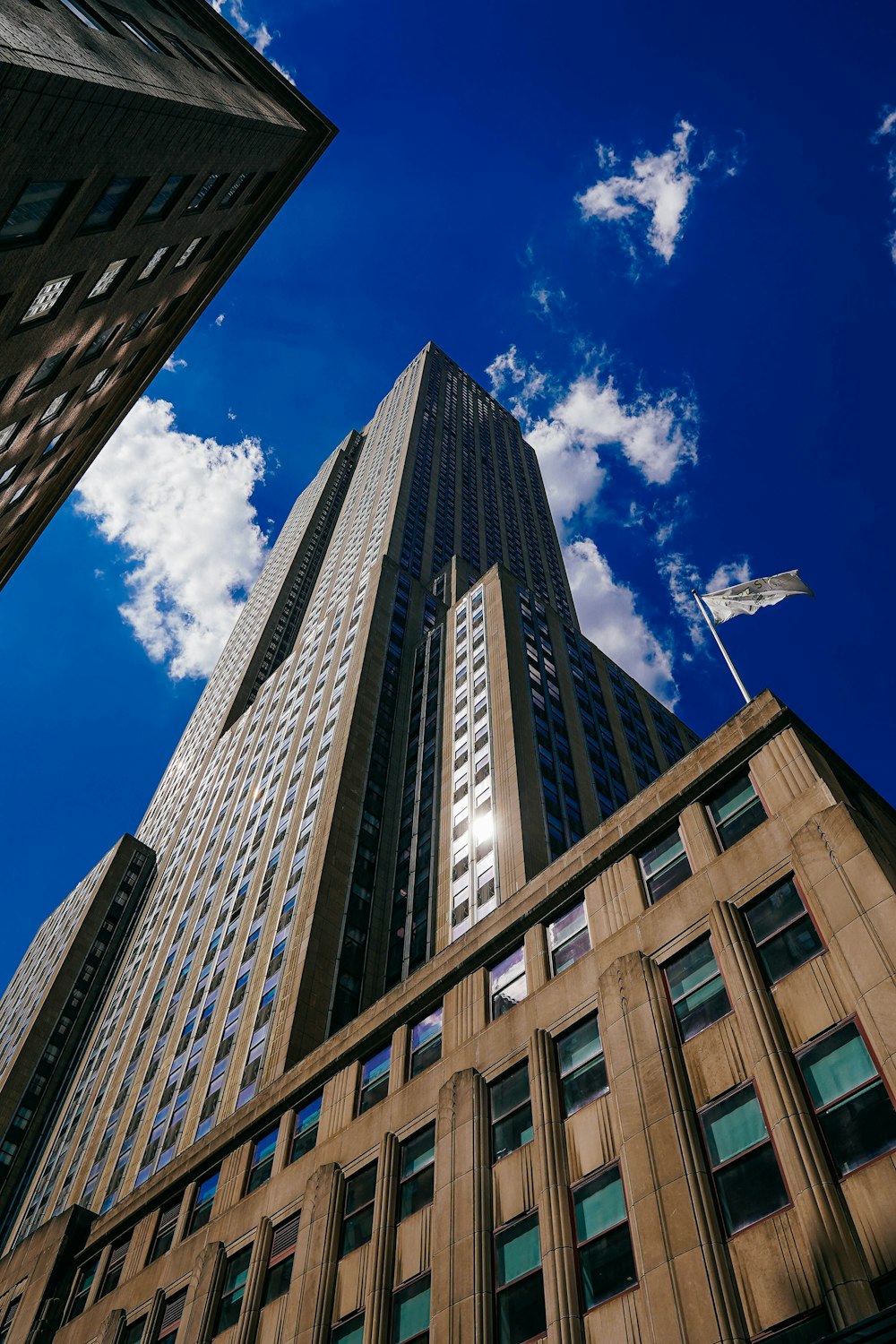 brown concrete building under blue sky during daytime