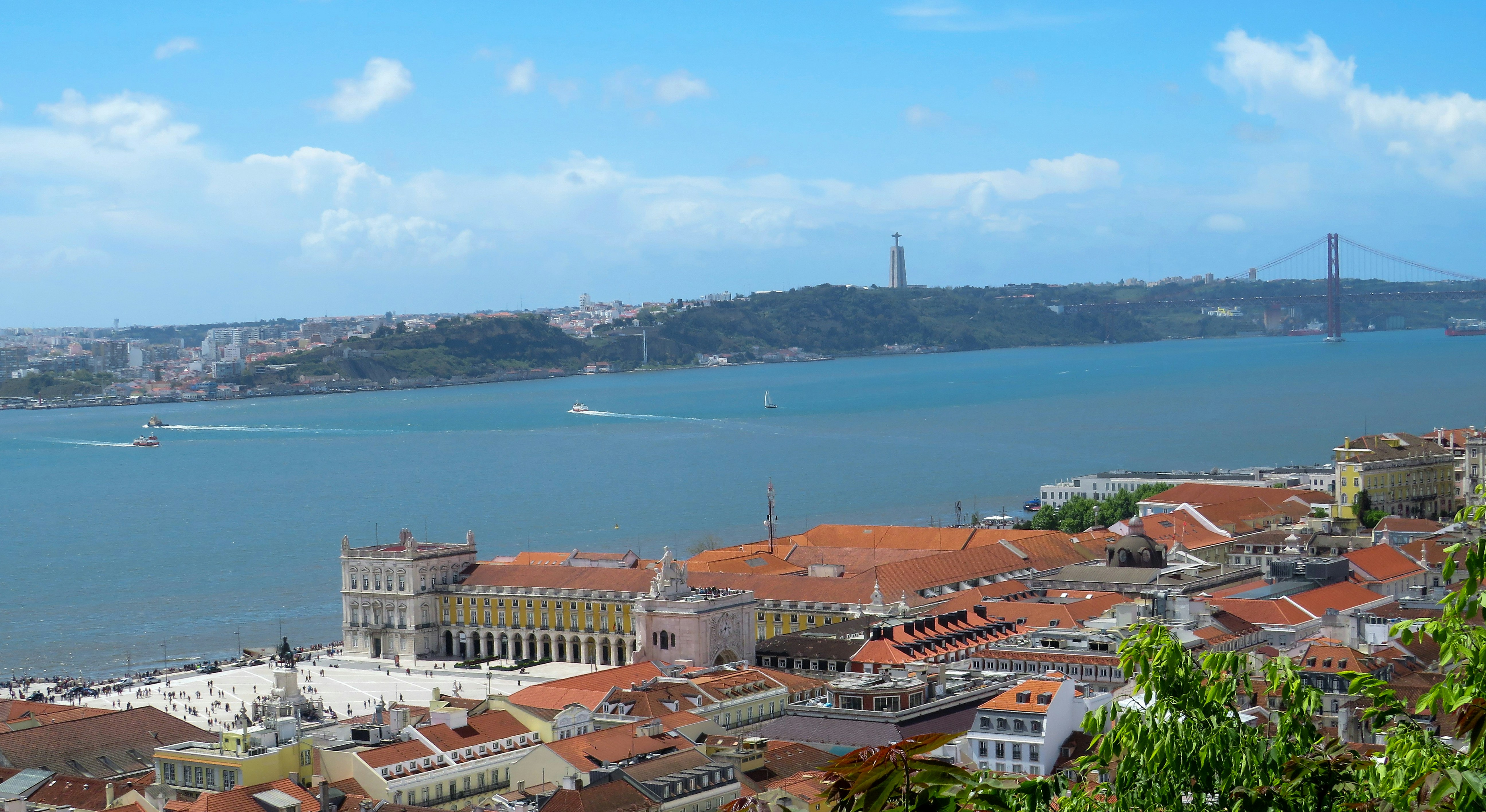 brown and white concrete buildings near body of water during daytime