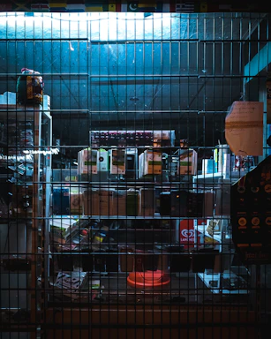 Close-up of sleek electrical devices neatly arranged on a display shelf in a Baghdad store.
