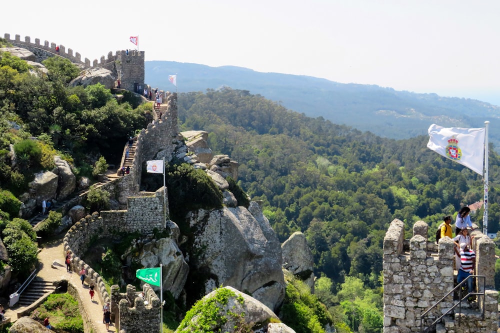 gray concrete castle on top of the mountain