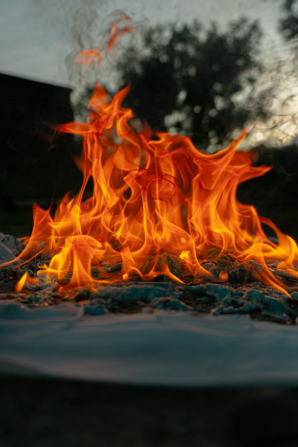 orange fire on gray concrete floor