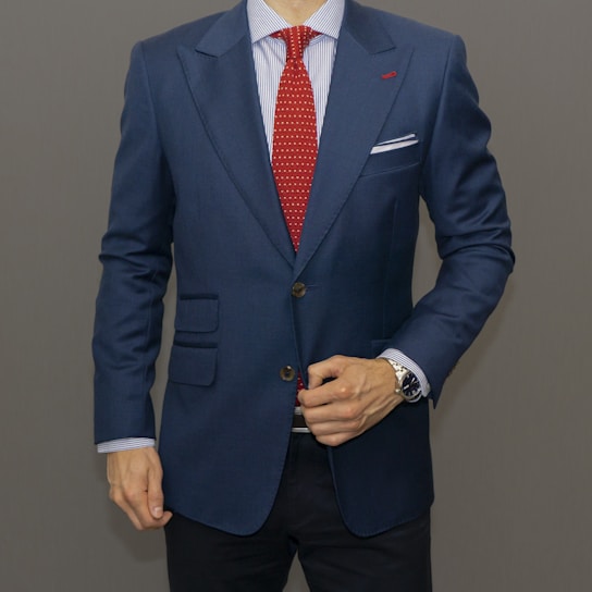 man in blue suit jacket