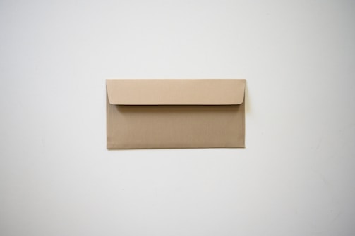 brown cardboard box on white table