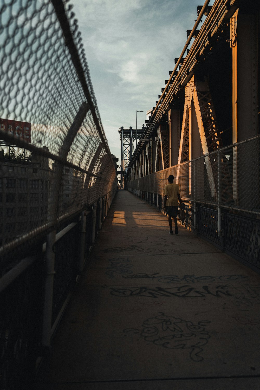 people walking on bridge during daytime