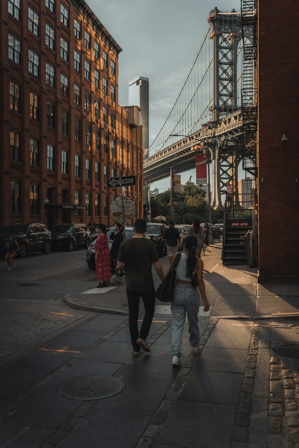 people walking on sidewalk during daytime