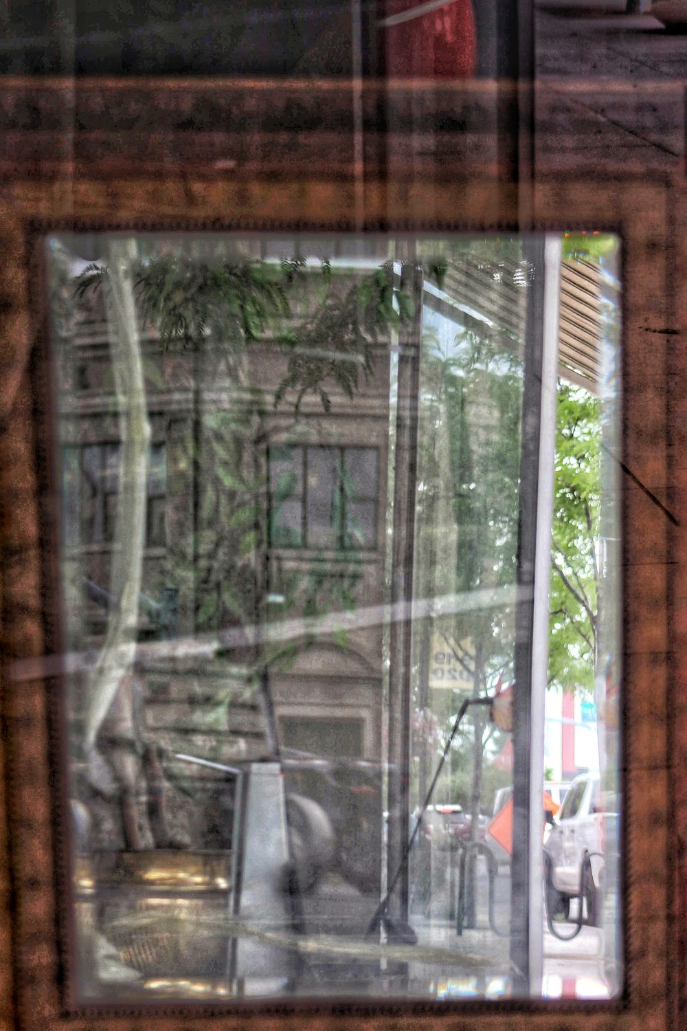 brown wooden framed glass window