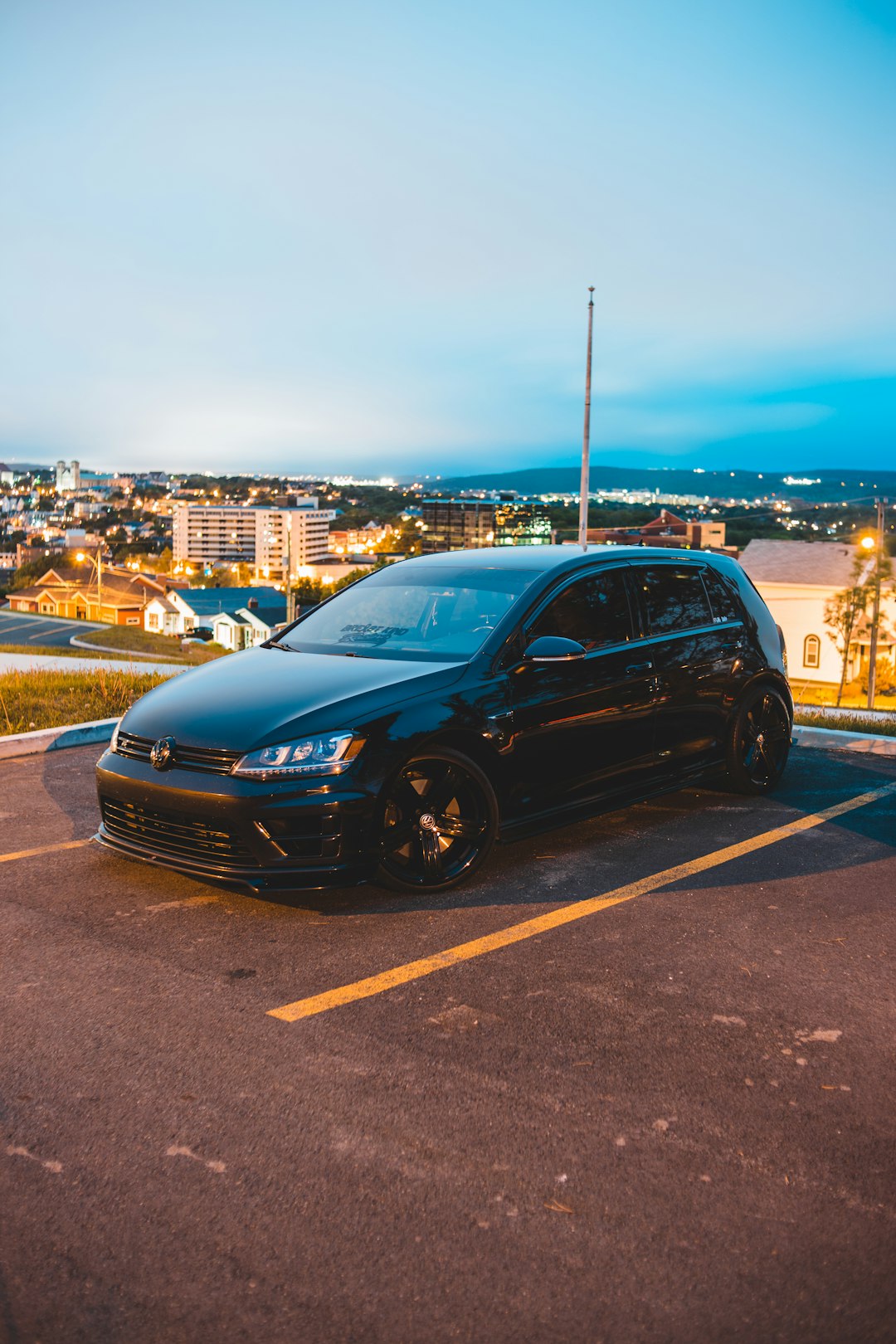 black mercedes benz c class on a highway during daytime