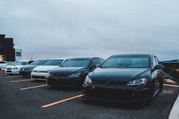black bmw m 3 coupe on parking lot