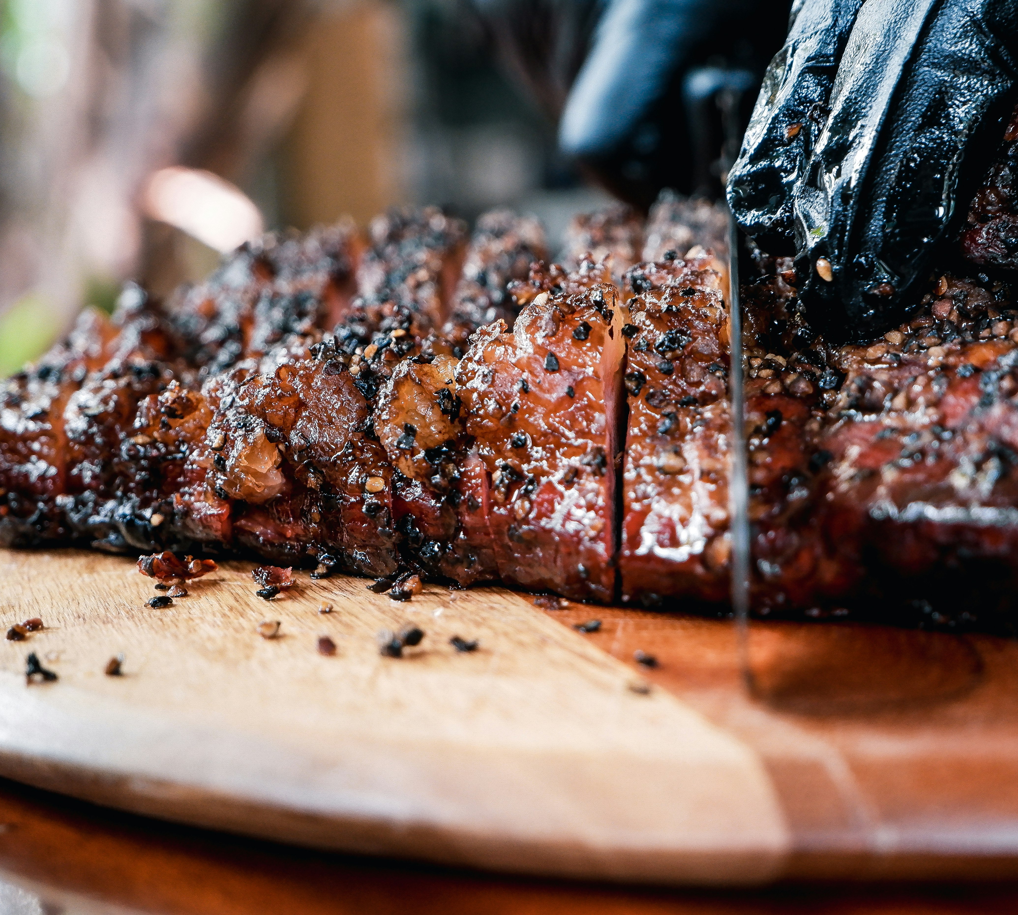 grilled meat on brown wooden chopping board