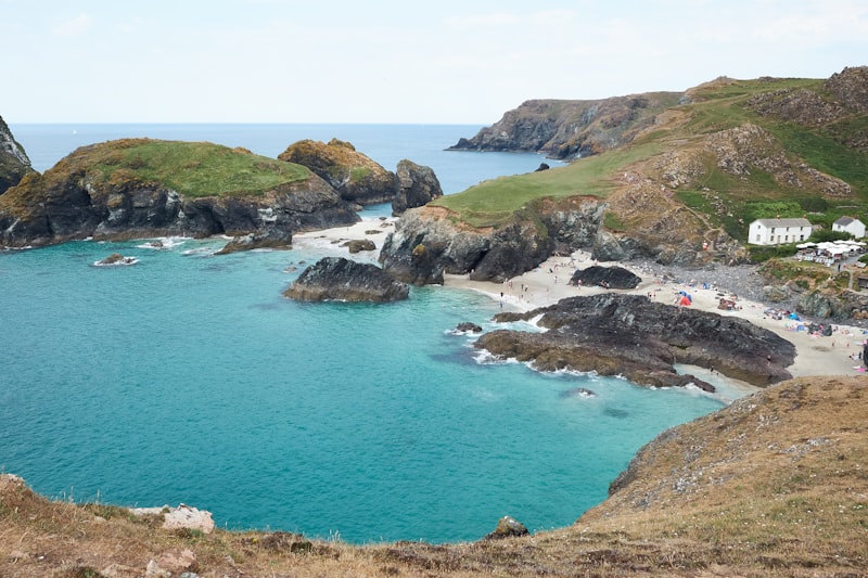 Turquoise water and serpentine rock stacks at Kynance Cove