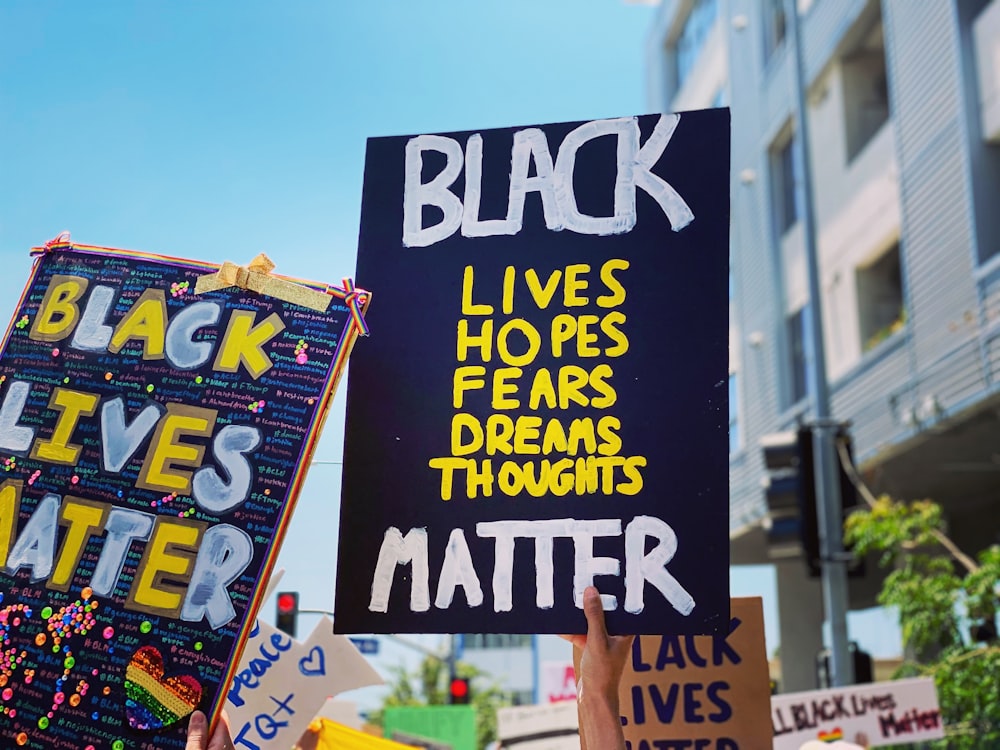 black and yellow happy birthday signage