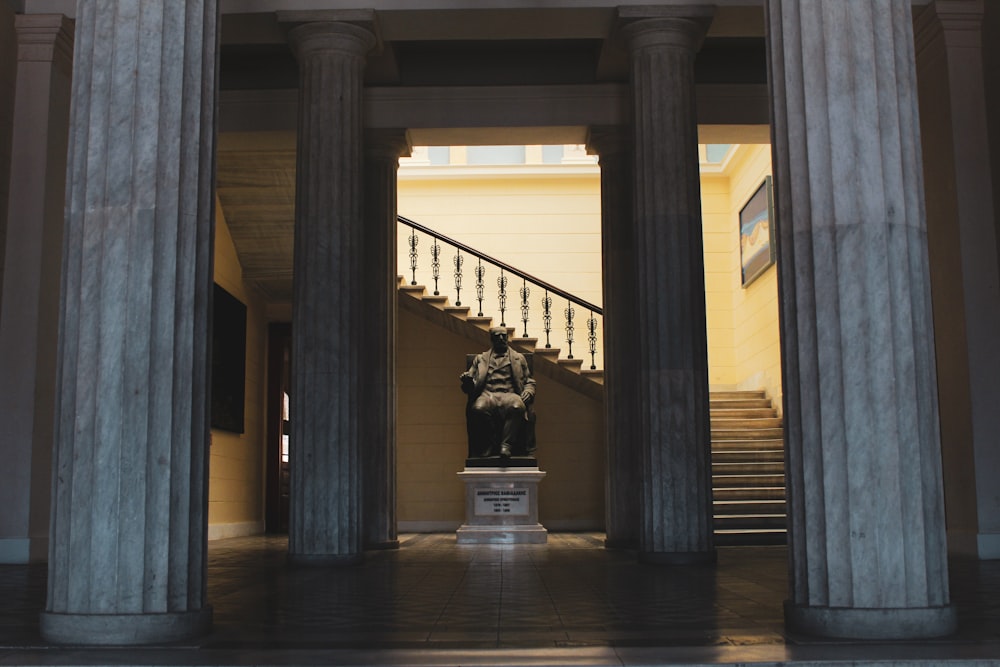 black statue on white concrete building