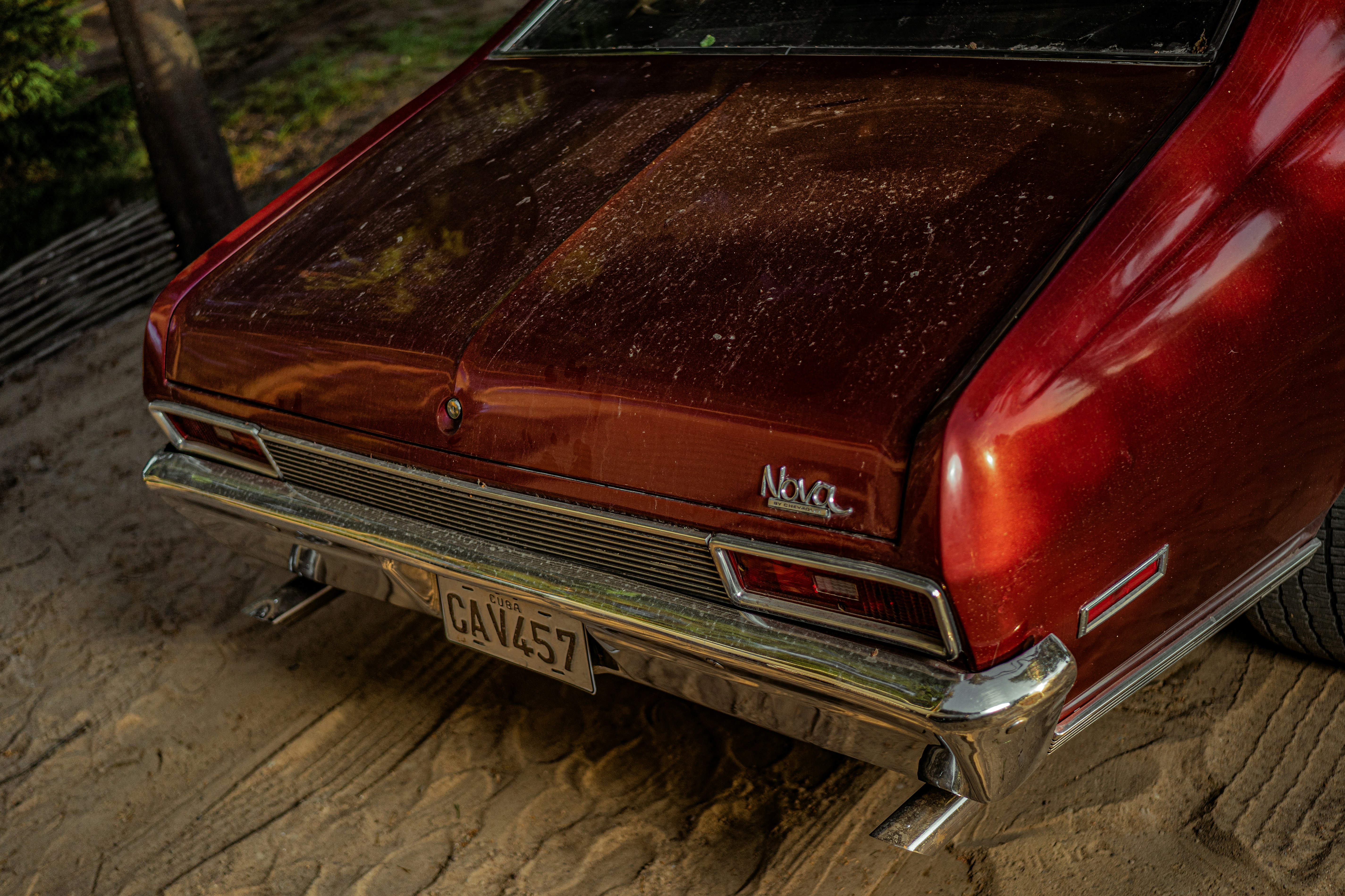 brown car on gray concrete pavement