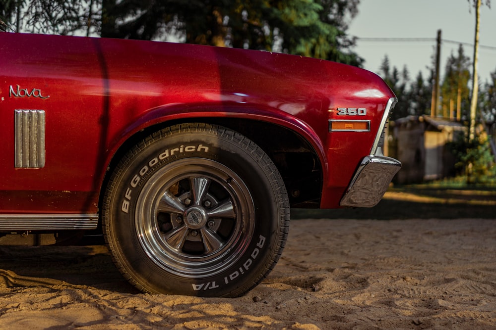 red car with chrome wheel