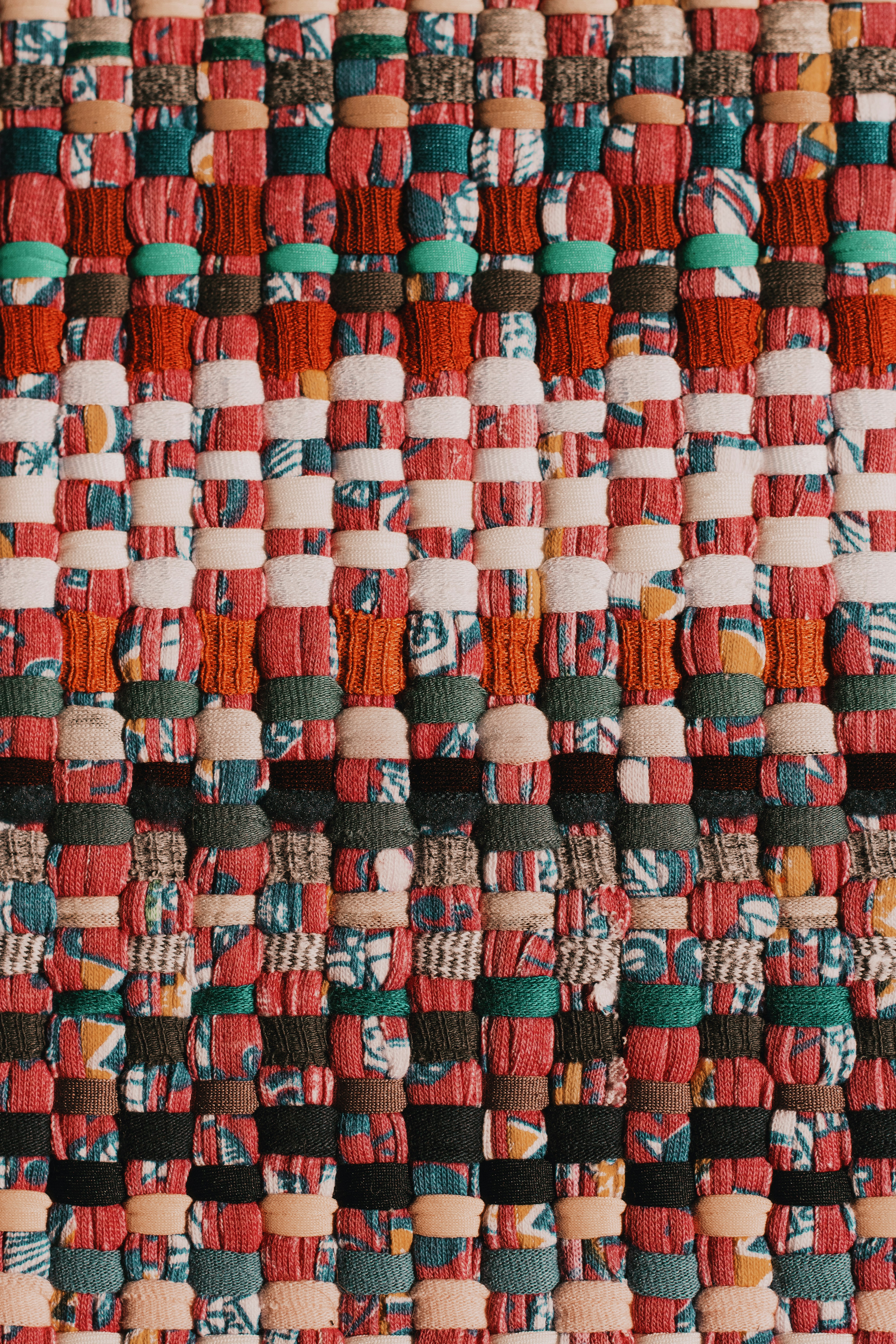 red green and blue textile