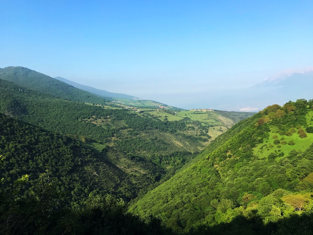 green mountains under blue sky during daytime