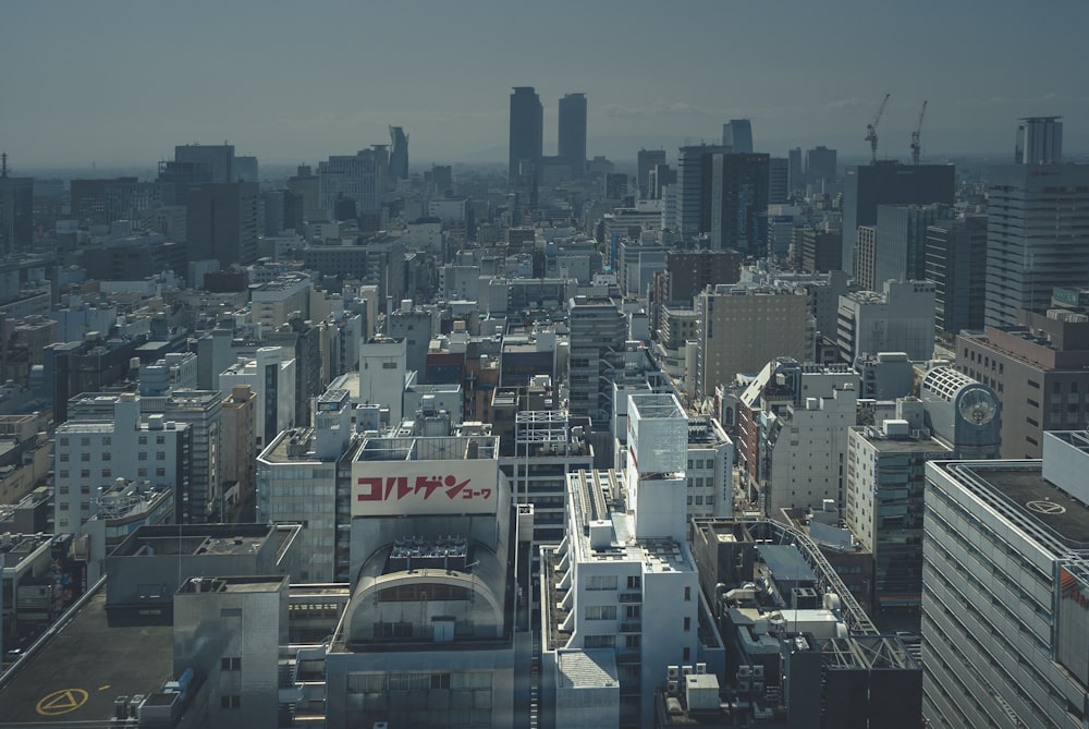 city buildings under blue sky during daytime