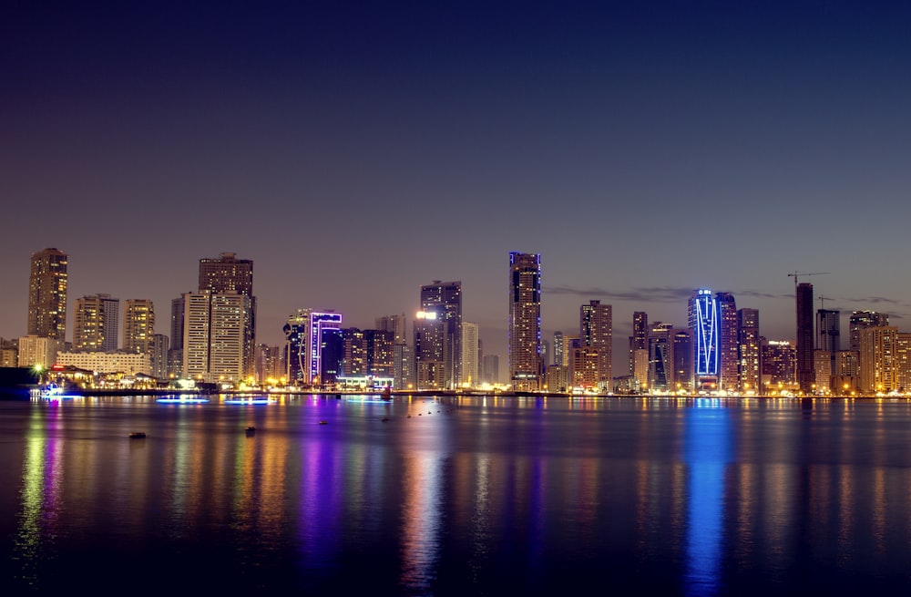 city skyline during night time