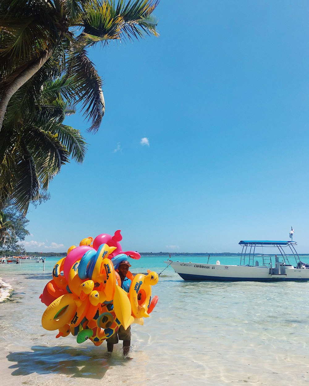 white boat on sea during daytime