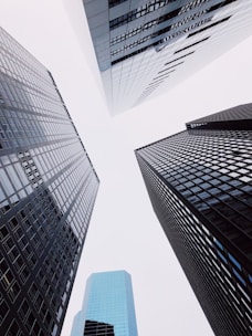 low angle photography of high rise buildings