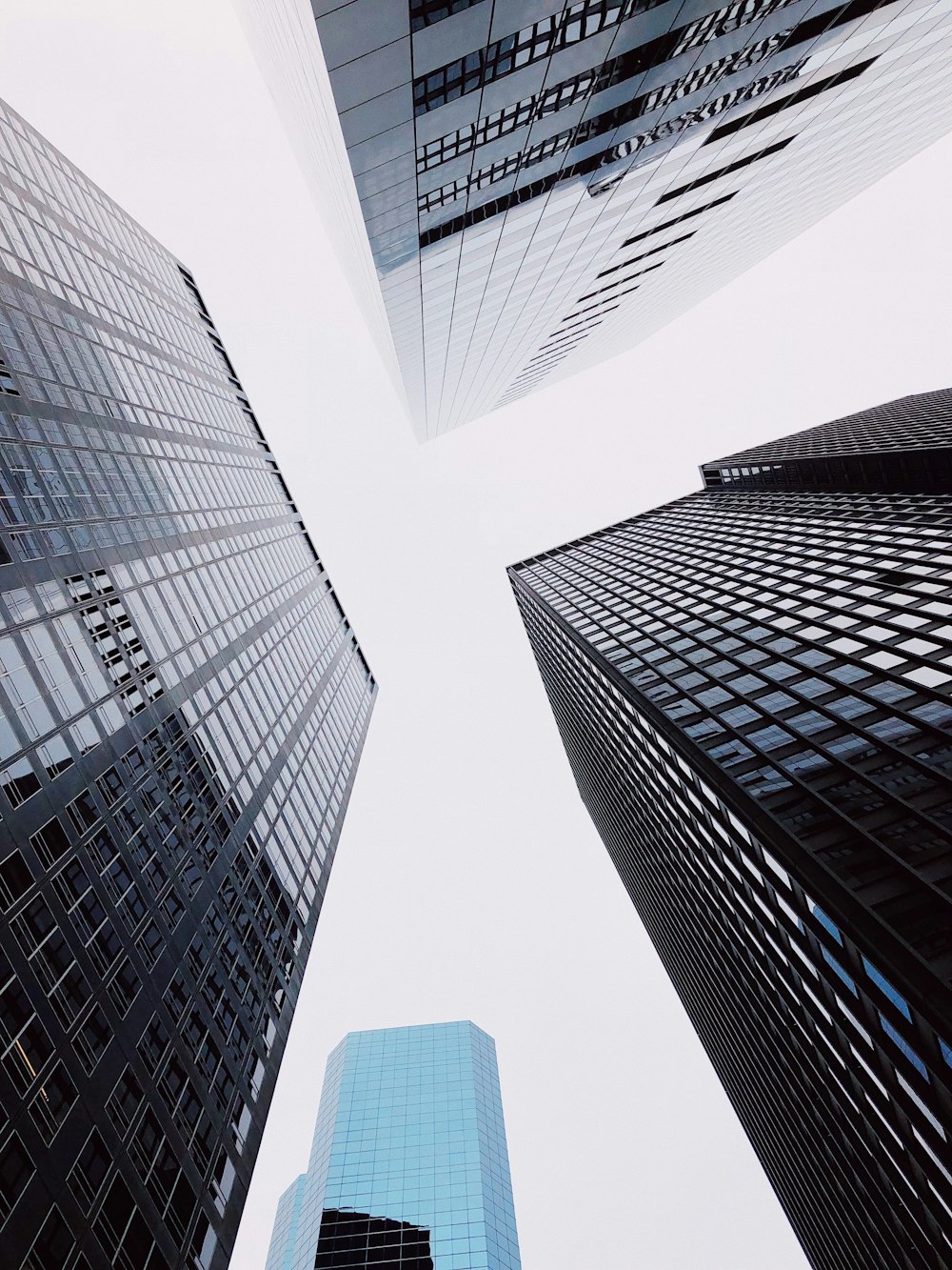 low angle photography of high rise buildings