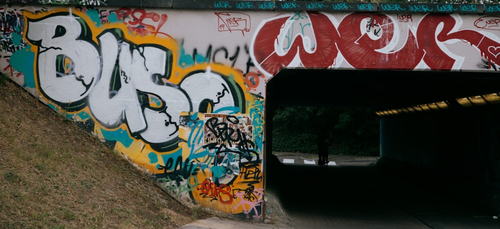 red white and blue graffiti on wall