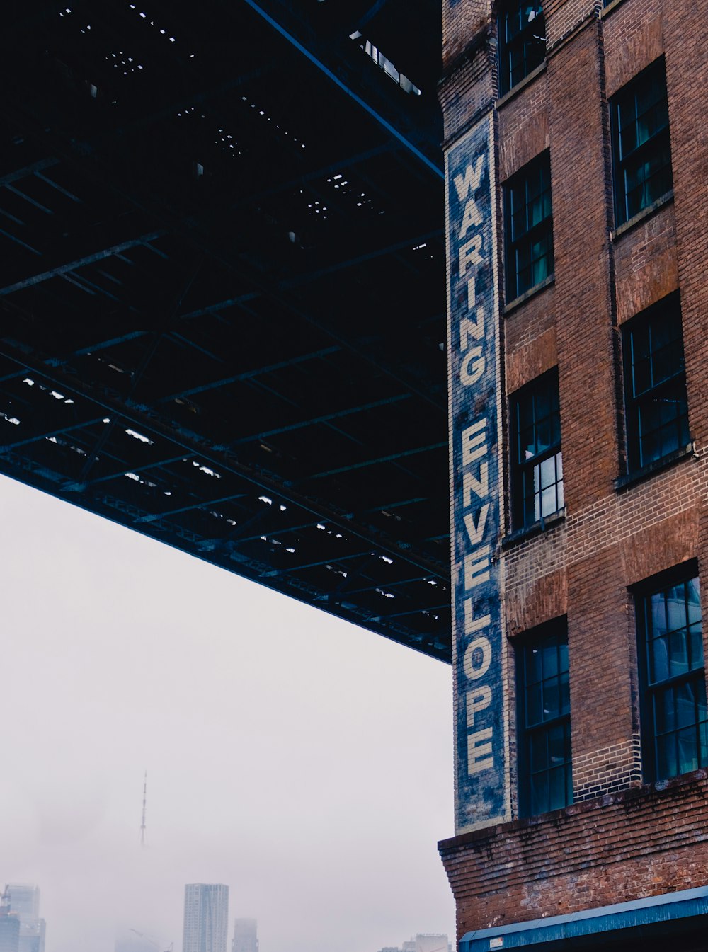 brown concrete building under white sky during daytime