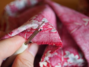 person holding black ballpoint pen