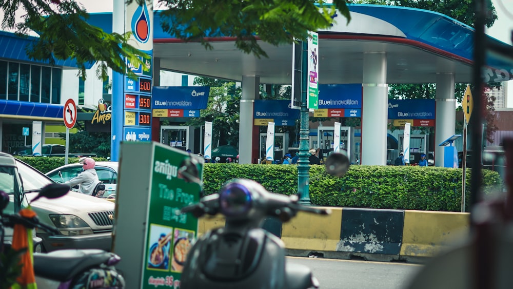 man in black helmet riding motorcycle on road during daytime