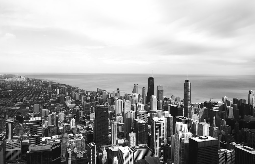 grayscale photo of city buildings