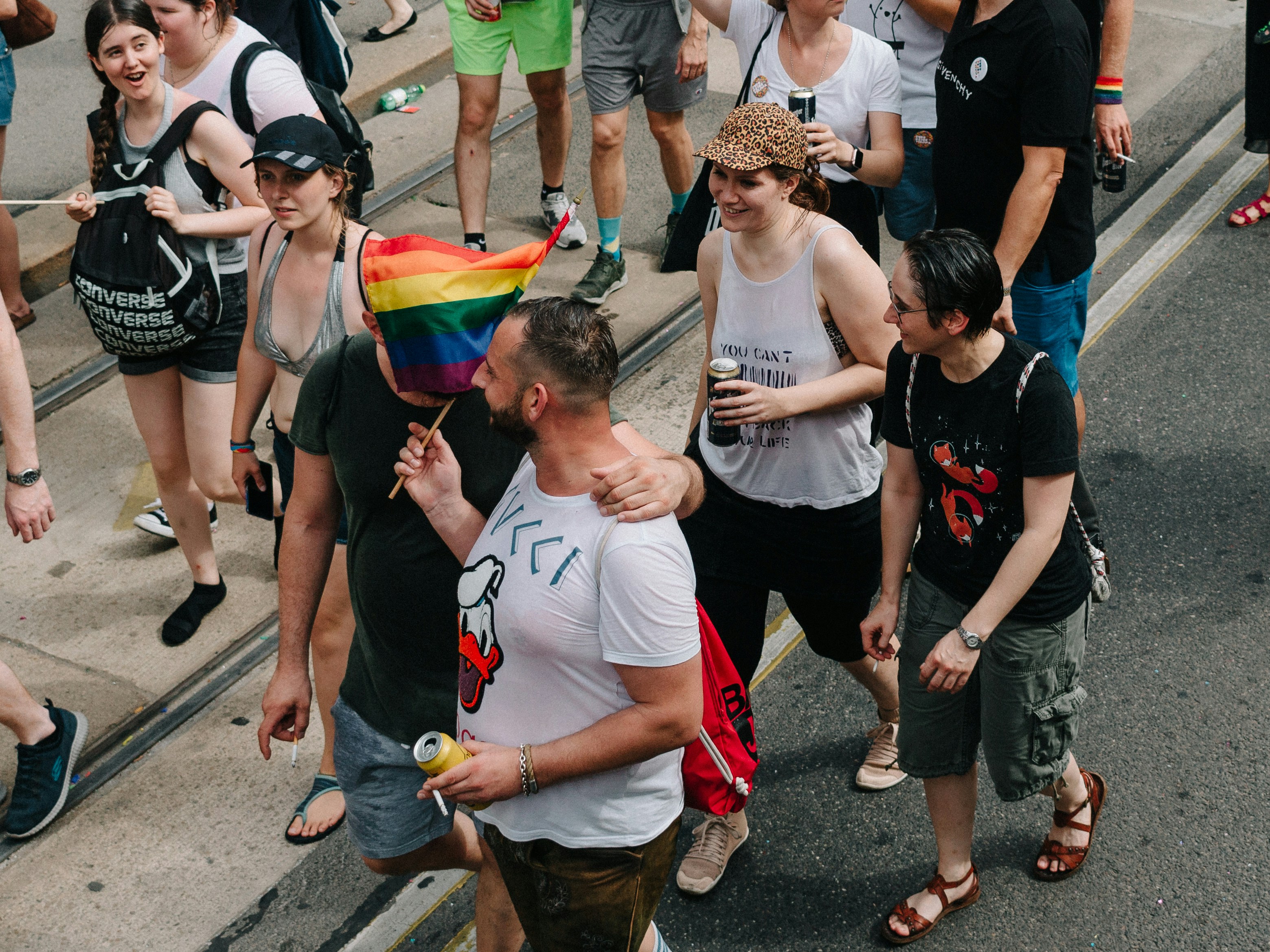 group of people standing on gray asphalt road during daytime, Pride in Vienna</p><p>